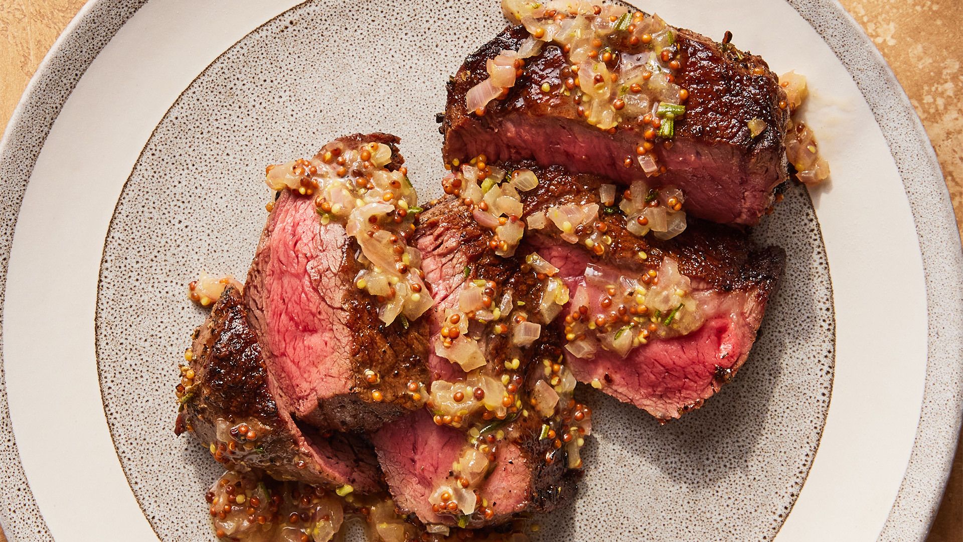 Pan-Seared Steak with Mustard Seeds, Black Pepper, and Rosemary