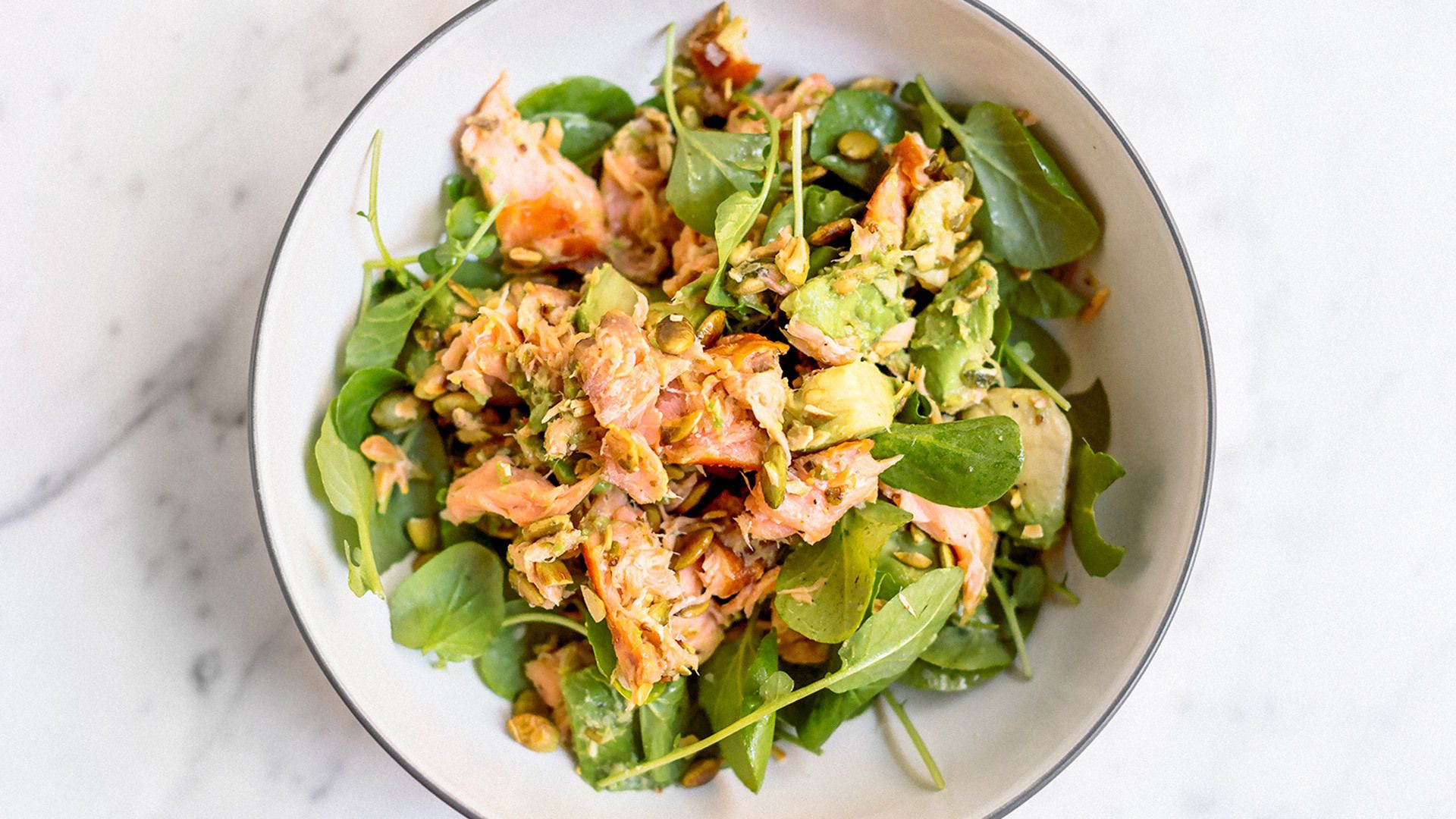 Hot Smoked Salmon Salad with Arugula, Avocado, and Pumpkin Seeds | Christopher Kimball’s Milk Street