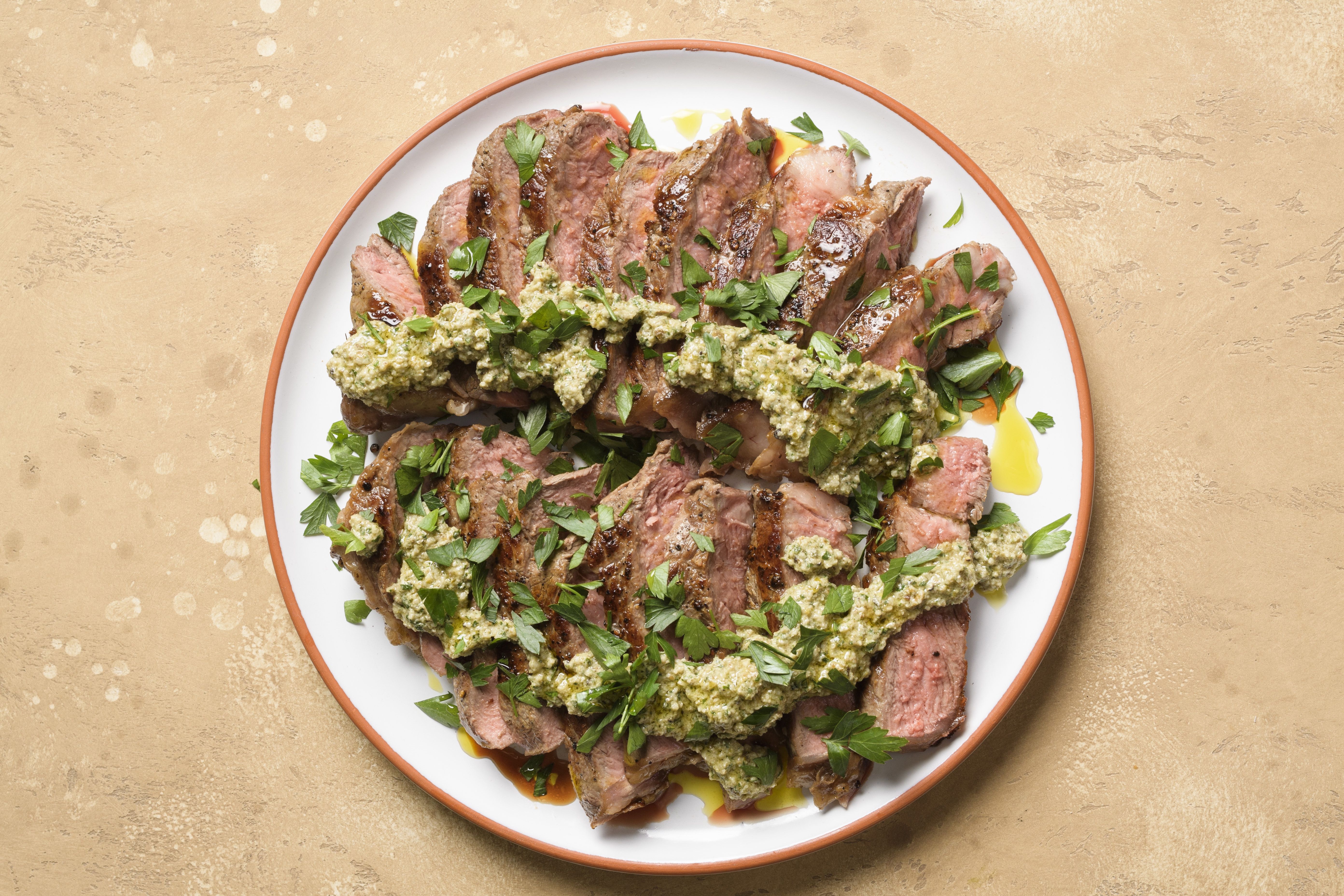 Strip Steaks with Walnut, Parsley and Caper Sauce | Christopher Kimball ...
