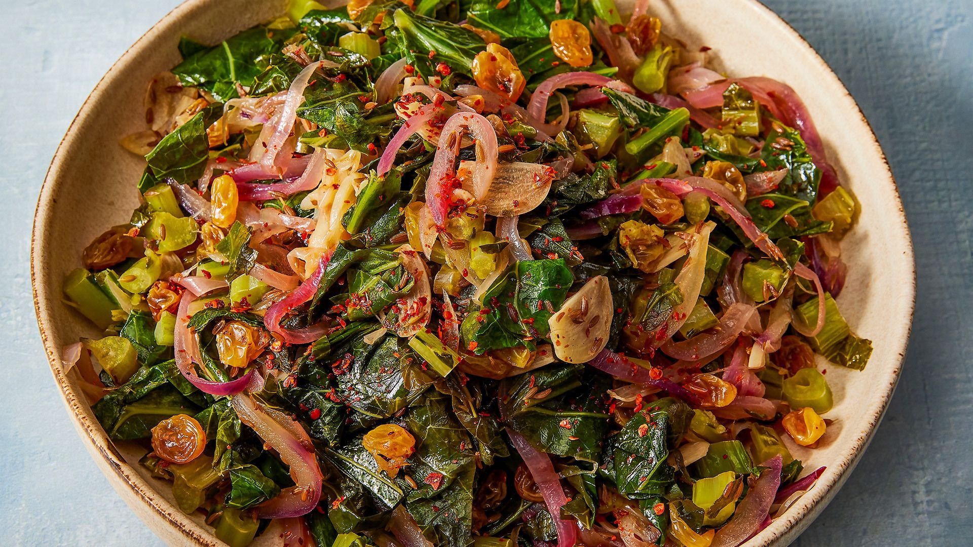 Braised Collard Greens with Cumin, Garlic and Sweet-Tart Raisins | Christopher Kimball’s Milk Street