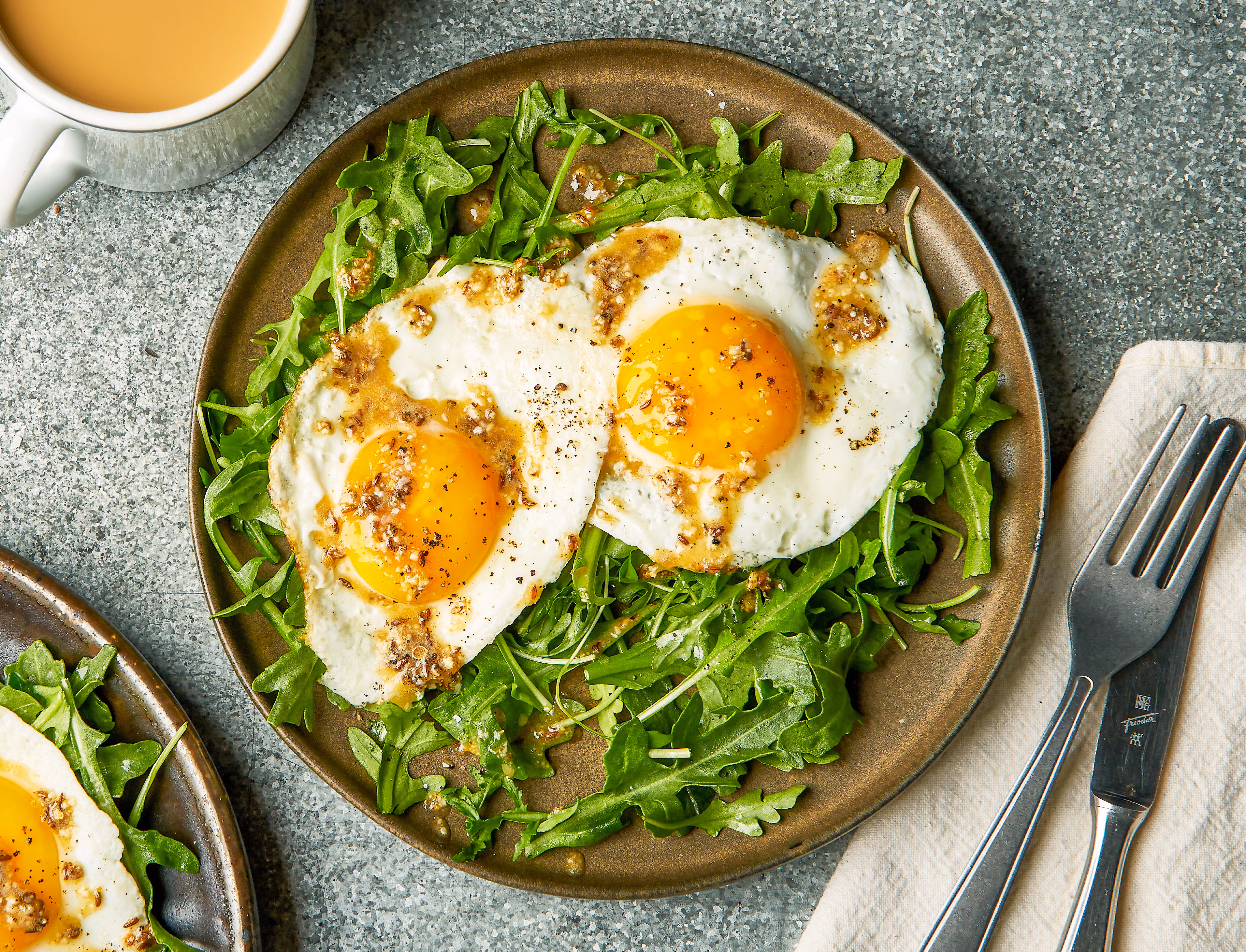 Fried Eggs with Arugula and Butter-Bloomed Dukkah